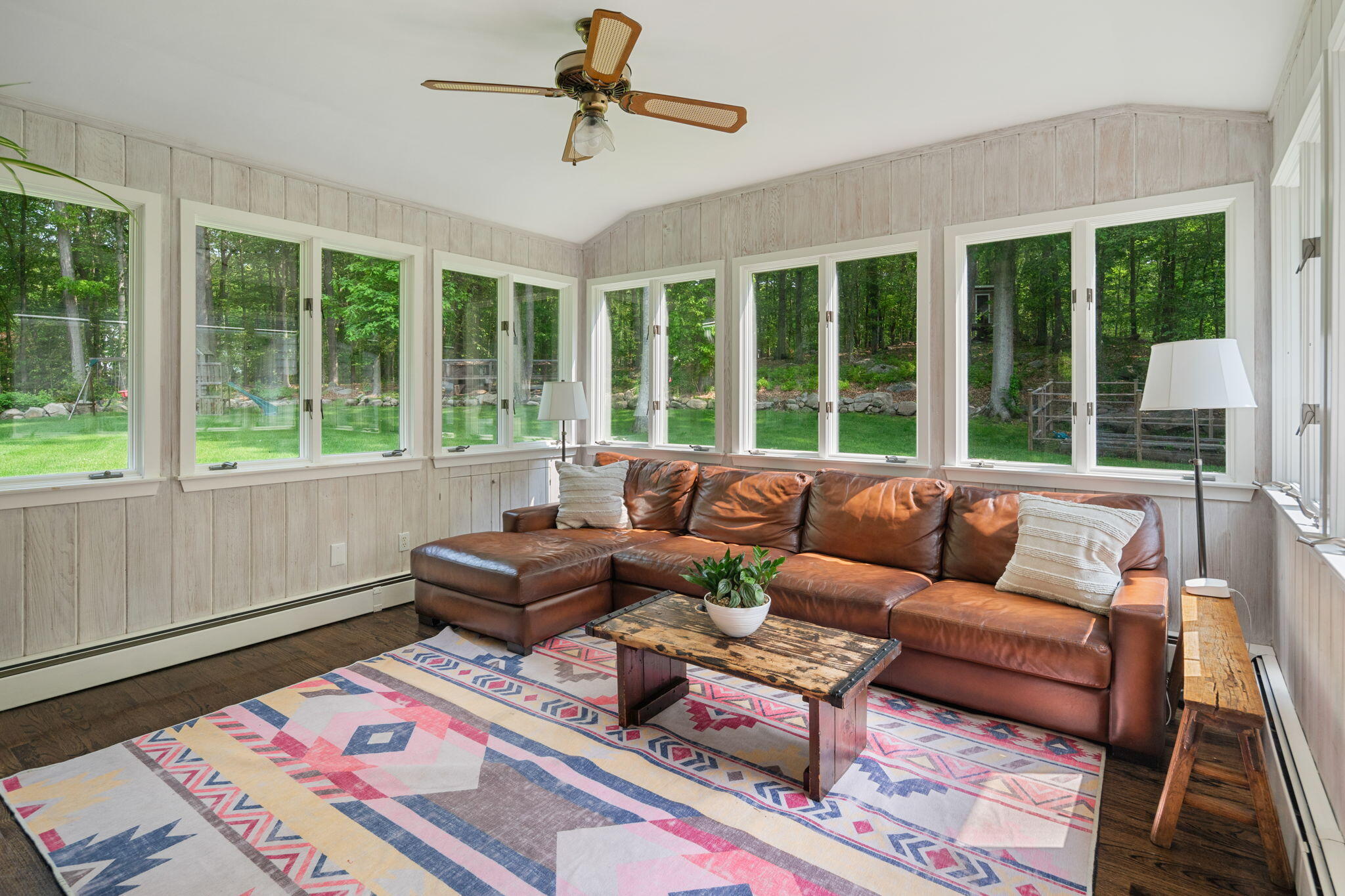 53 Fox Run Road New Canaan, CT 06840 - Photo 15 of 39 a living room with furniture and a large window