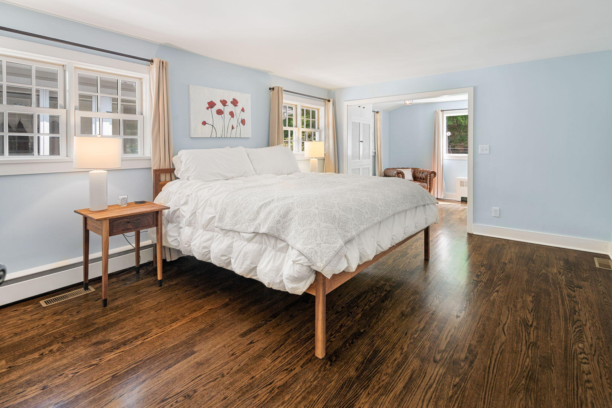 53 Fox Run Road New Canaan, CT 06840 - Photo 17 of 39 a bed sitting in a spacious bedroom next to a window and a chair