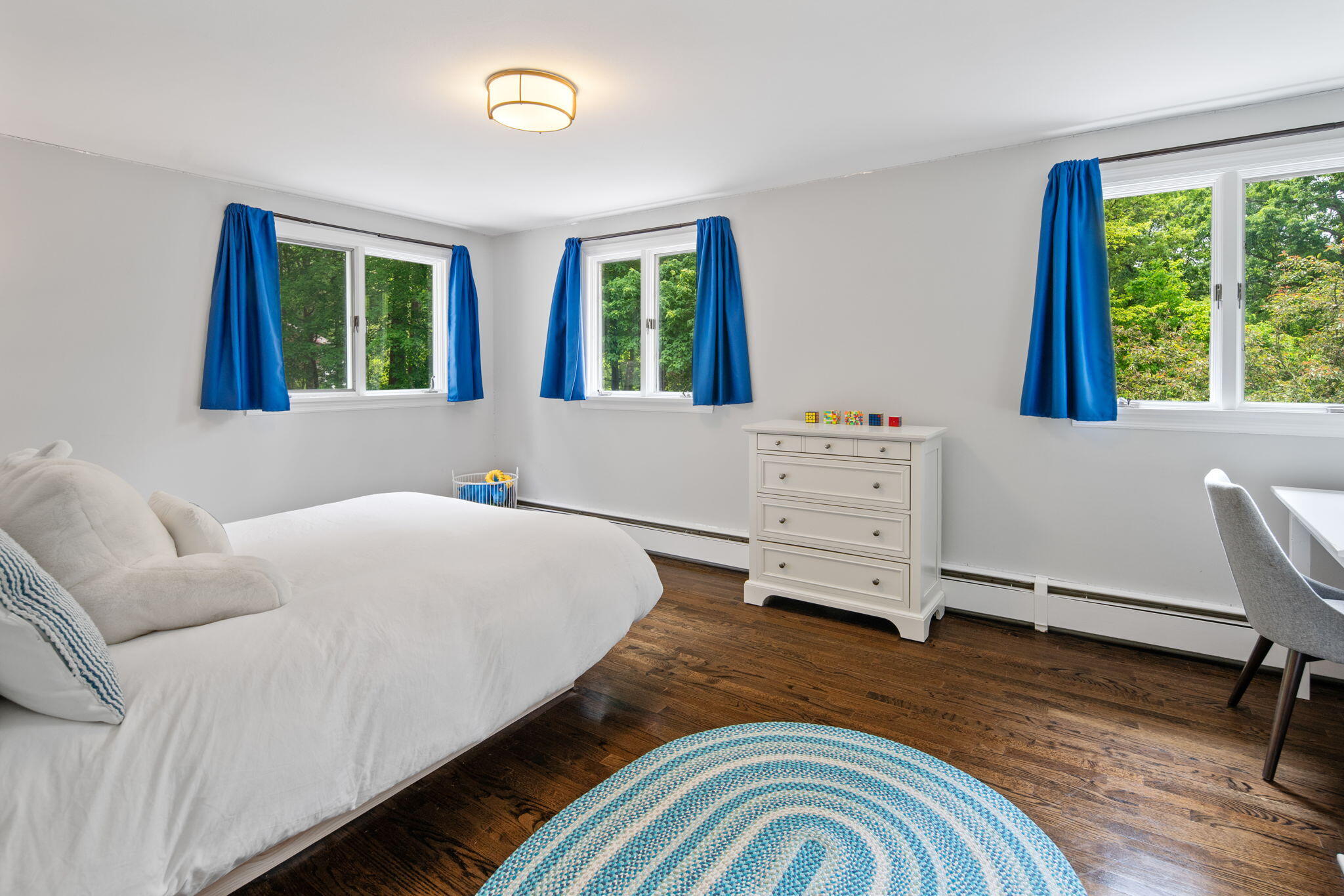 53 Fox Run Road New Canaan, CT 06840 - Photo 23 of 39 a living room with a bed furniture and a window