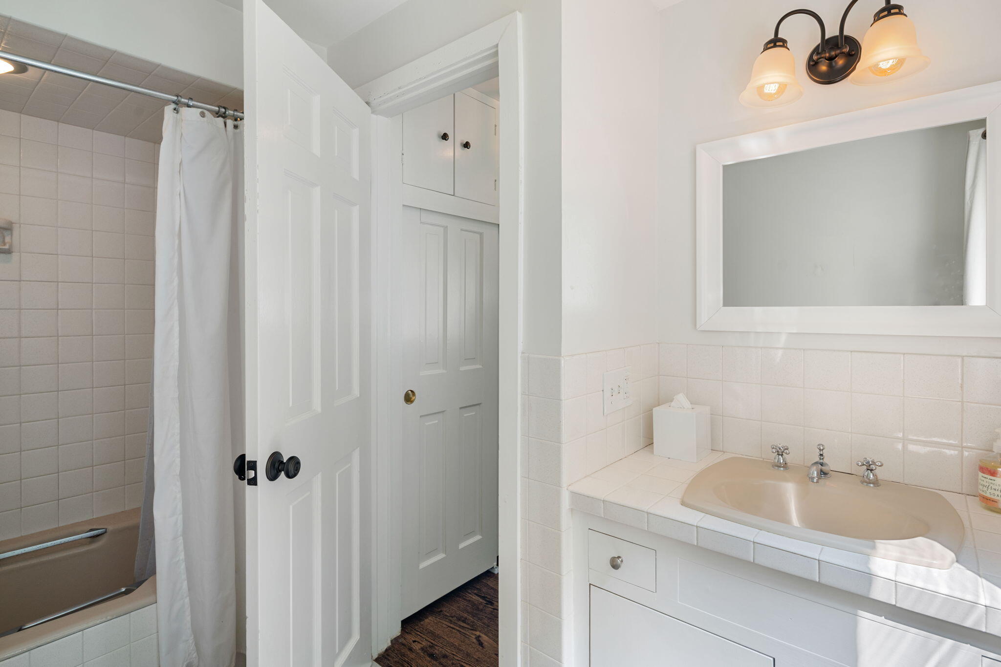 53 Fox Run Road New Canaan, CT 06840 - Photo 24 of 39 a bathroom with a sink and a mirror