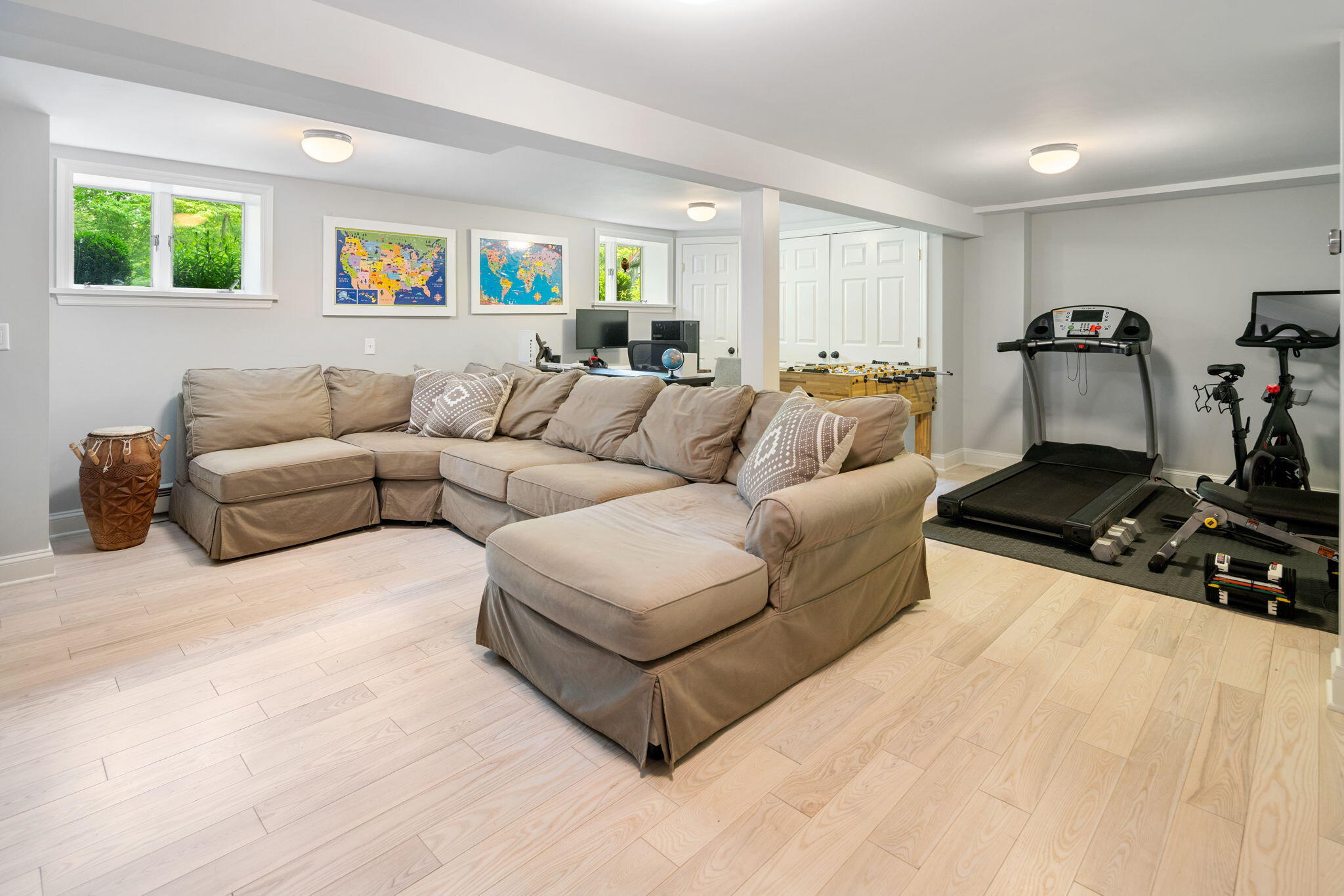 53 Fox Run Road New Canaan, CT 06840 - Photo 27 of 39 a living room with furniture window and a flat screen tv