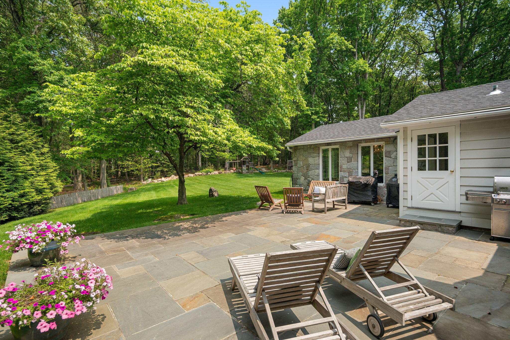 53 Fox Run Road New Canaan, CT 06840 - Photo 30 of 39 a view of a house with backyard and sitting area