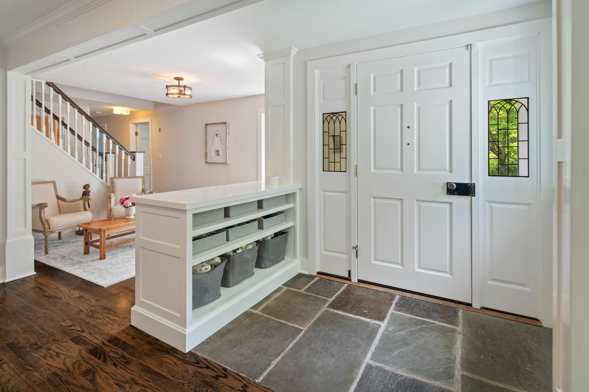 53 Fox Run Road New Canaan, CT 06840 - Photo 7 of 39 a view of a livingroom with furniture and staircase