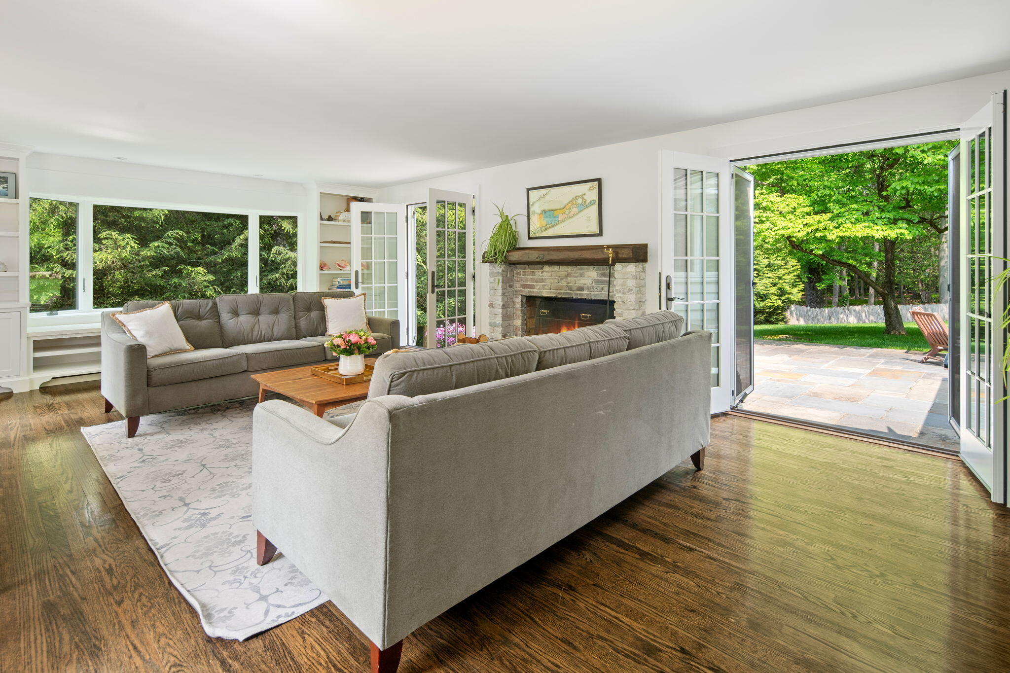 53 Fox Run Road New Canaan, CT 06840 - Photo 9 of 39 a living room with furniture and a fireplace