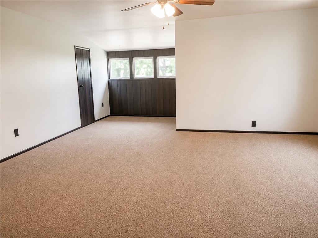 2836 Nazareth Road Easton, PA 18045 - Photo 13 of 19 A well-lit interior space features comfortable carpeting and a multi-paneled window.