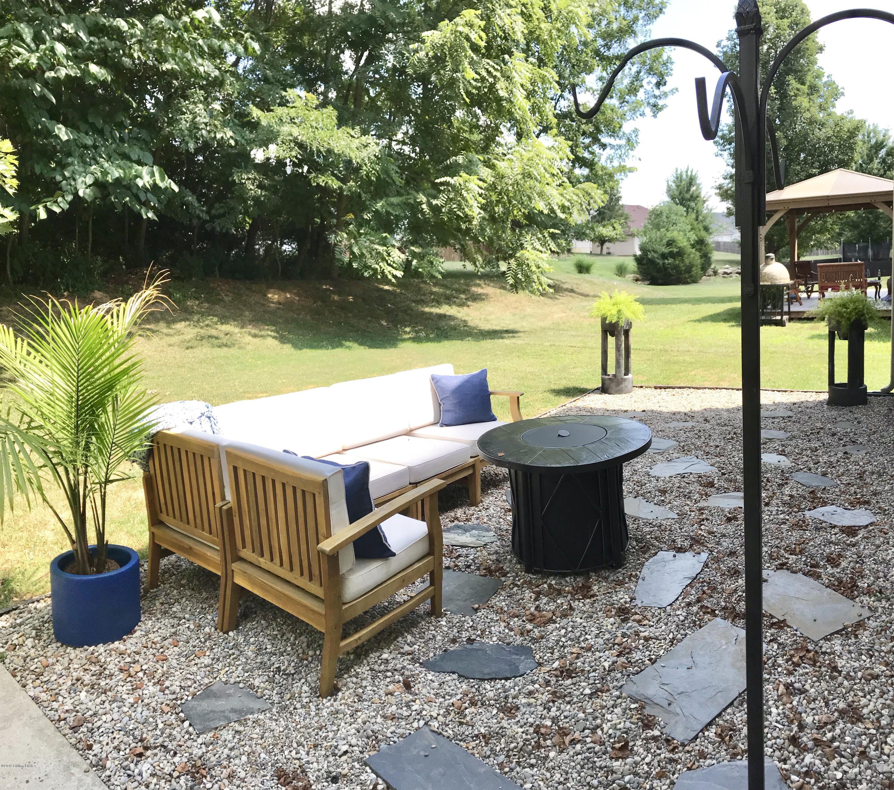 17322 Curry Branch Road Louisville, KY 40245 - Photo 37 of 49 Beautiful backyard that backs up to a private wooded area.