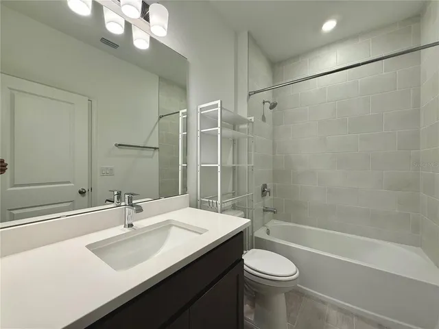 a view of a field with an ocean view