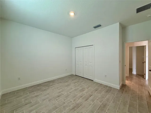 a view of a room with an empty space