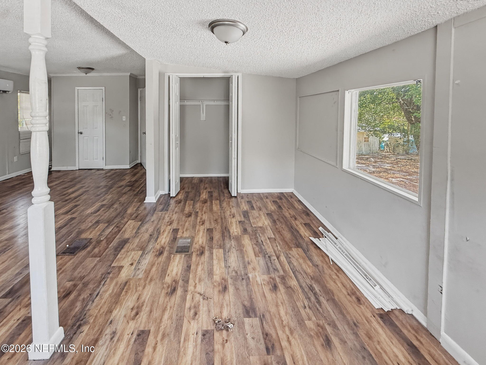 326 Cahoon Road South Jacksonville, FL 32220 - Photo 18 of 34 a view of empty room with wooden floor and fan