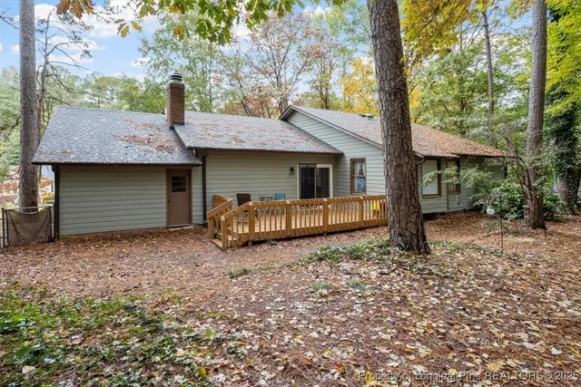 a house view with a backyard space