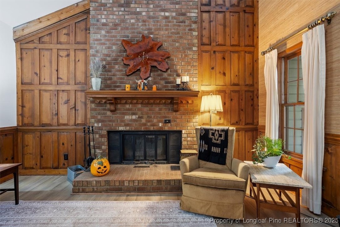 5108 Bridlington Lane Raleigh, NC 27612 - Photo 6 of 19 a living room with furniture and a fireplace