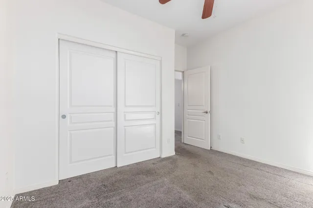 an empty room with closet