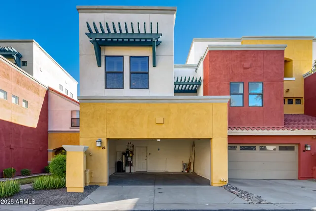 a row of palm trees sitting on the side of a street