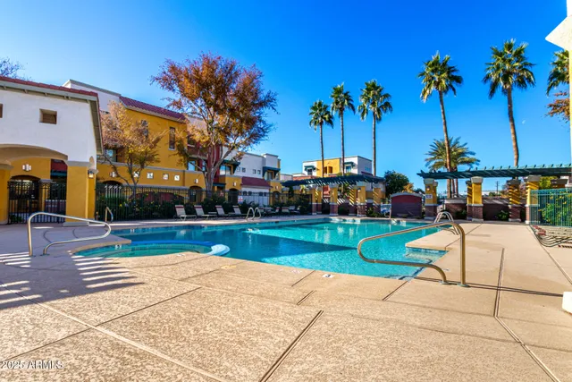 a view of a park with potted plants