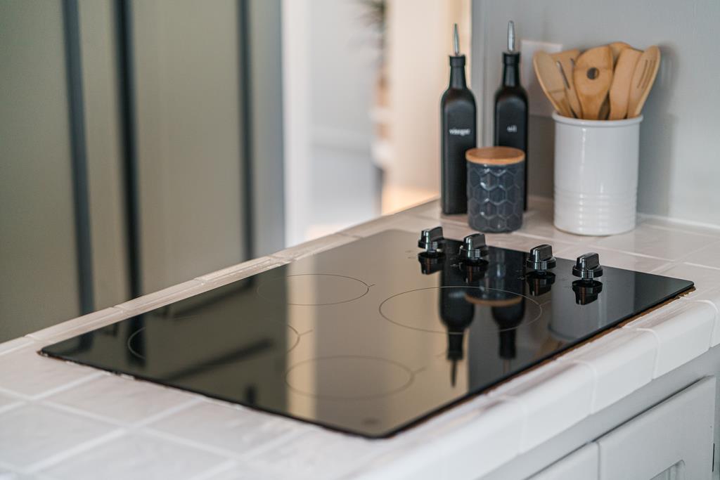 390 Brooktree Ranch Road Aptos, CA 95003 - Photo 17 of 33 a kitchen with a stove and a refrigerator