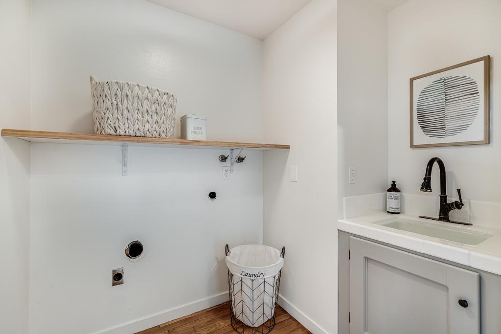 390 Brooktree Ranch Road Aptos, CA 95003 - Photo 20 of 33 a bathroom with a sink and a mirror