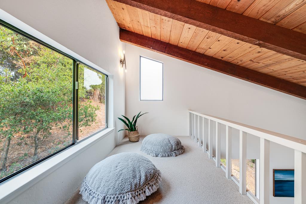 390 Brooktree Ranch Road Aptos, CA 95003 - Photo 26 of 33 a bedroom with a bed and window