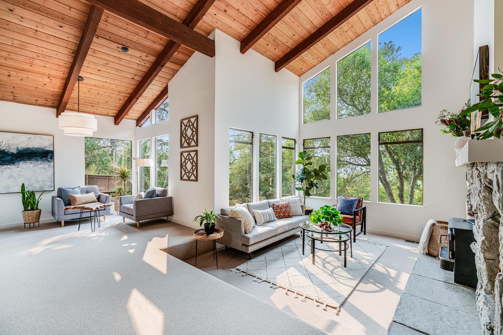 390 Brooktree Ranch Road Aptos, CA 95003 - Photo 4 of 33 a living room with furniture and a large window