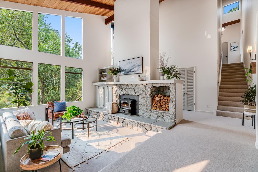 390 Brooktree Ranch Road Aptos, CA 95003 - Photo 5 of 33 a living room with furniture and a fireplace