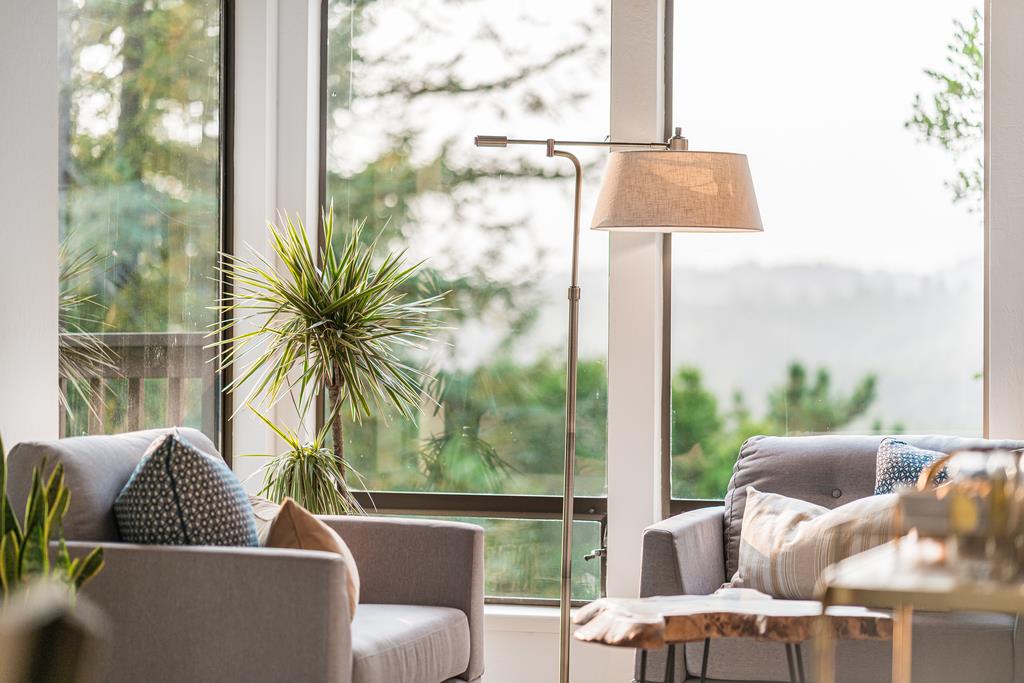 390 Brooktree Ranch Road Aptos, CA 95003 - Photo 9 of 33 a living room with furniture and a window