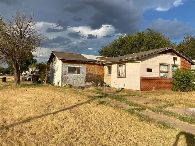 a view of a house with a patio