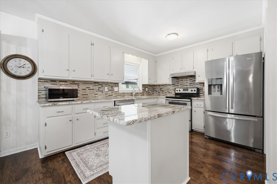 404 Bermuda Hundred Road Chester, VA 23836 - Photo 12 of 37 Modern kitchen featuring a central island with a g
