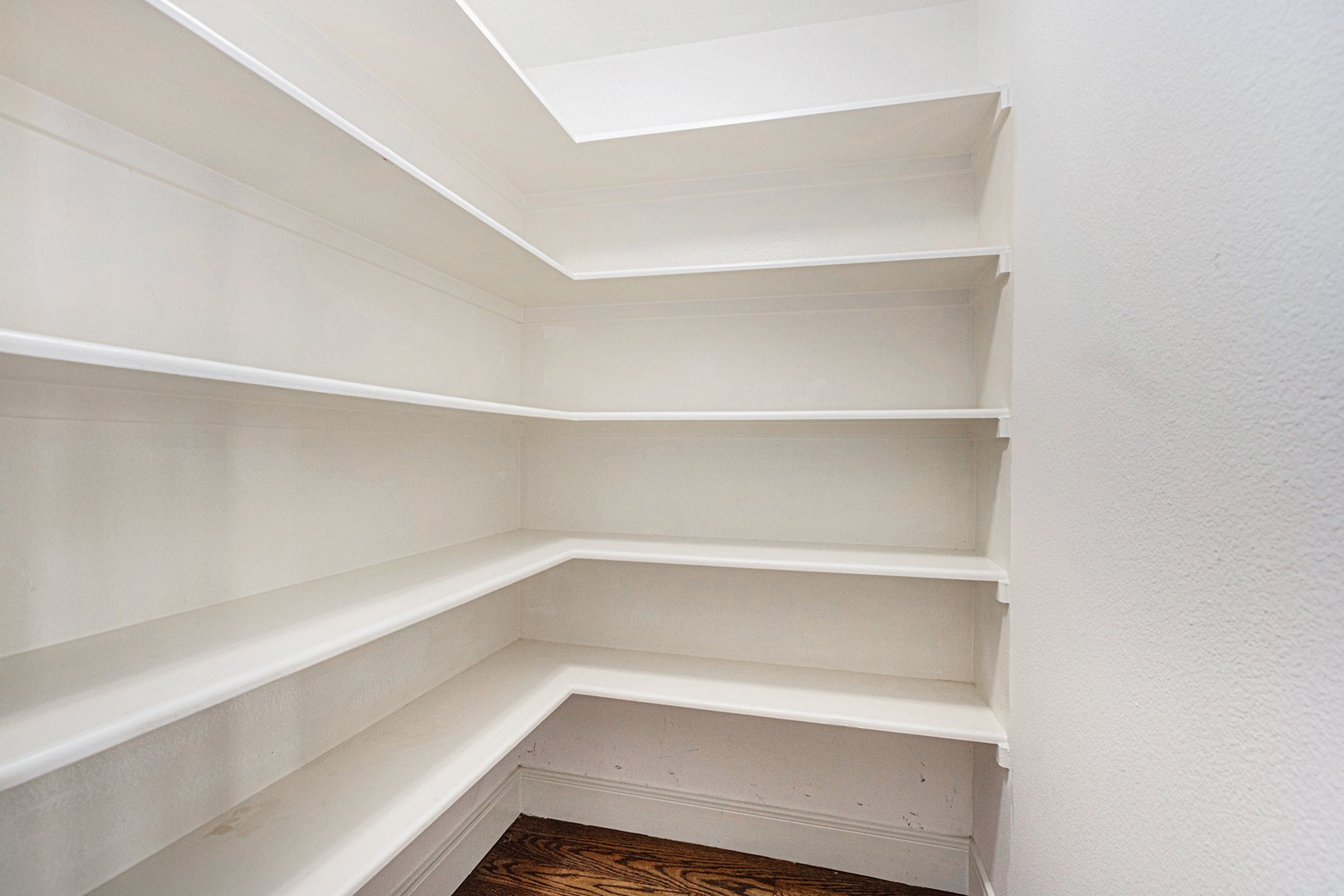 2402 Calumet Street, Unit B Houston, TX 77004 - Photo 16 of 40 a storage room with empty racks