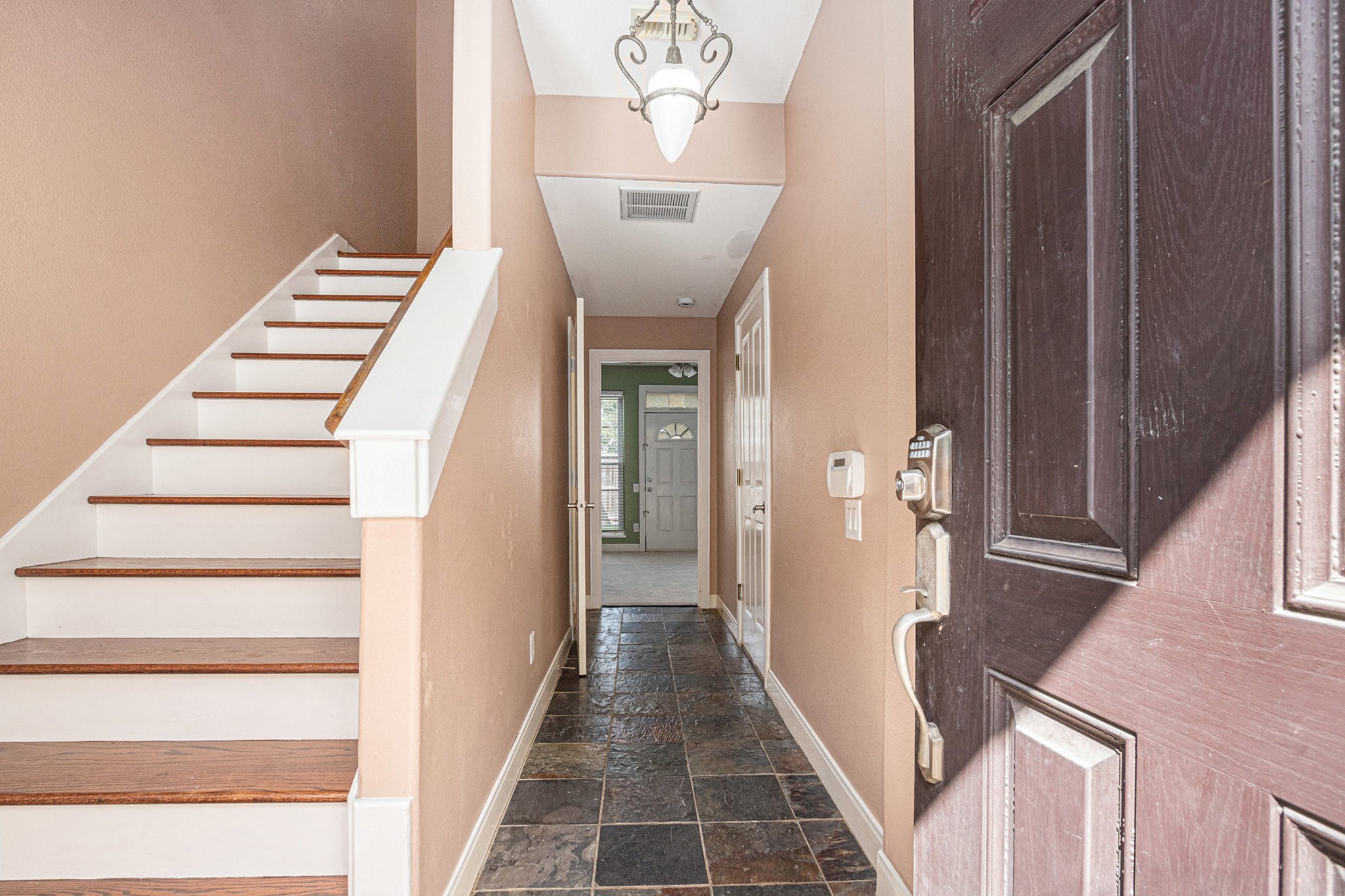 2402 Calumet Street, Unit B Houston, TX 77004 - Photo 4 of 40 a view of a hallway with front door