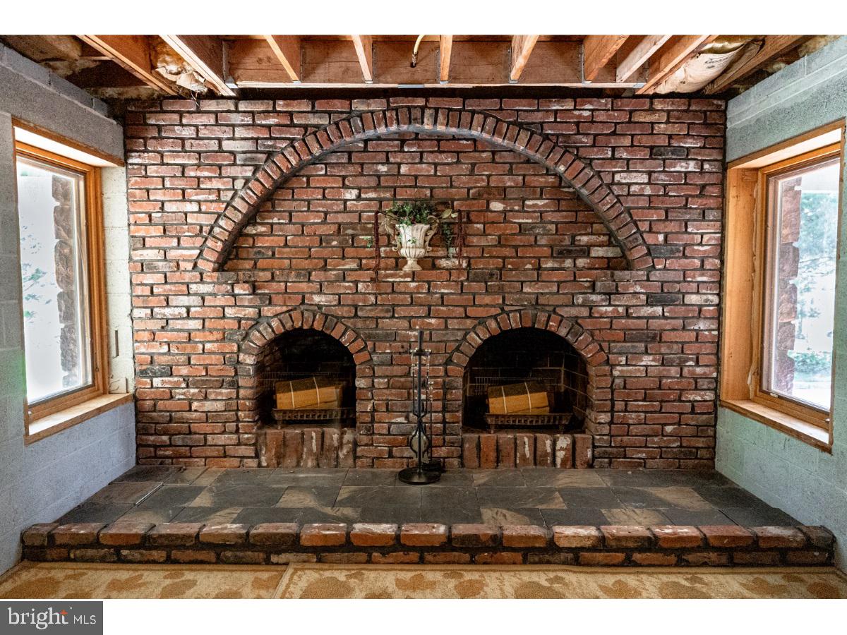 45 Spring Mt Road Schwenksville, PA 19473 - Photo 44 of 80 Fireplace with fire box wood storage