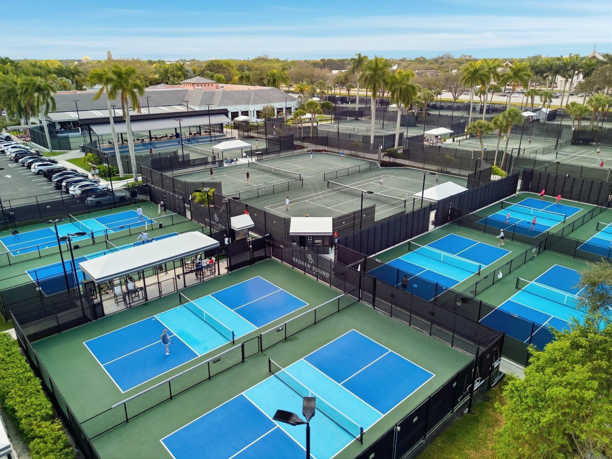 2498 Northwest 63rd Street Boca Raton, FL 33496 - Photo 34 of 39 a view of a big room with pool table and a chairs