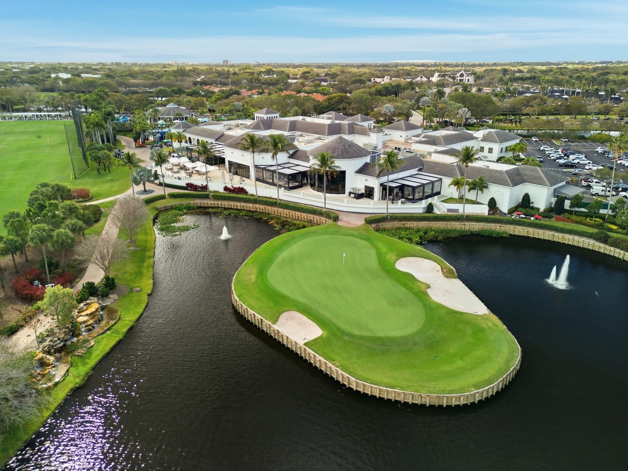 2498 Northwest 63rd Street Boca Raton, FL 33496 - Photo 37 of 39 an aerial view of residential houses with outdoor space and lake