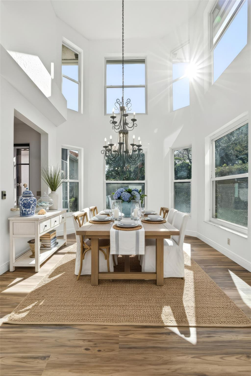 2498 Northwest 63rd Street Boca Raton, FL 33496 - Photo 7 of 39 a view of a dining room with furniture window and wooden floor