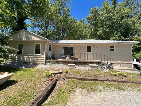 a view of a house with swimming pool