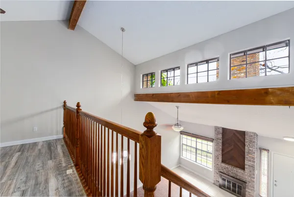 a view of a livingroom with furniture and windows