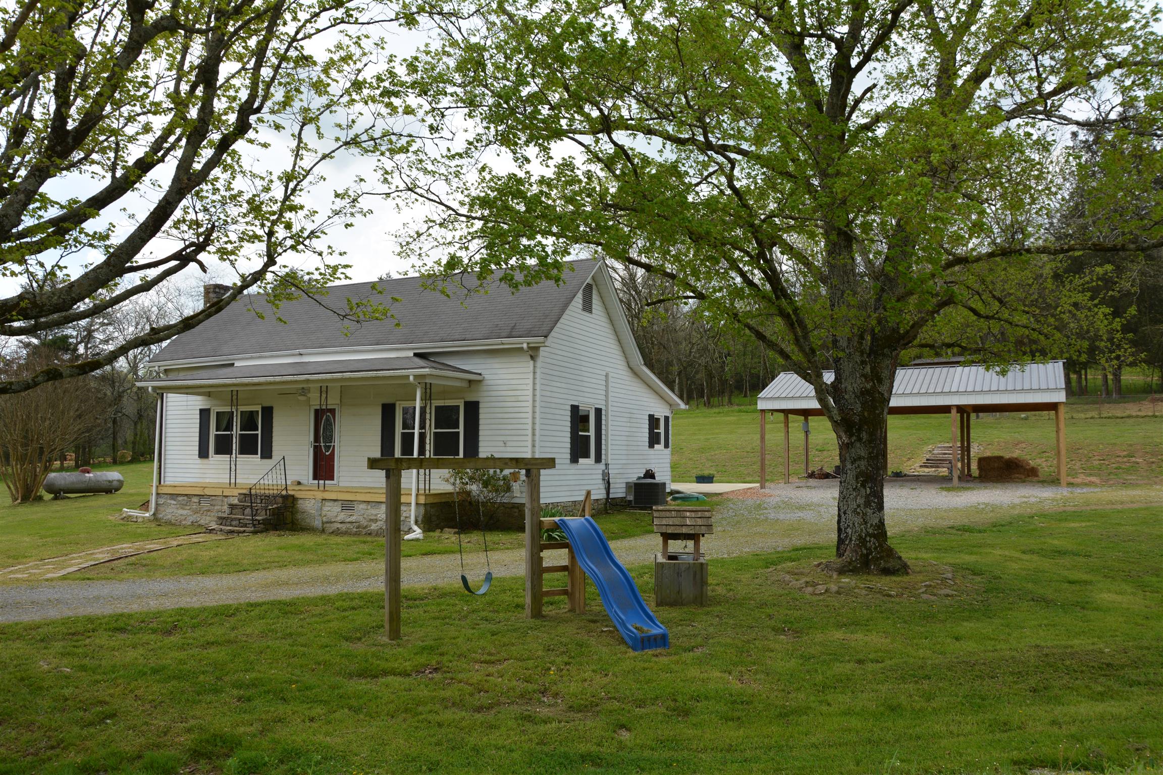 136 McBurg Road Frankewing, TN 38459 - Photo 16 of 20 This lovely home is back off of the road just enough, boasts a 3 car carport and that country feel.
