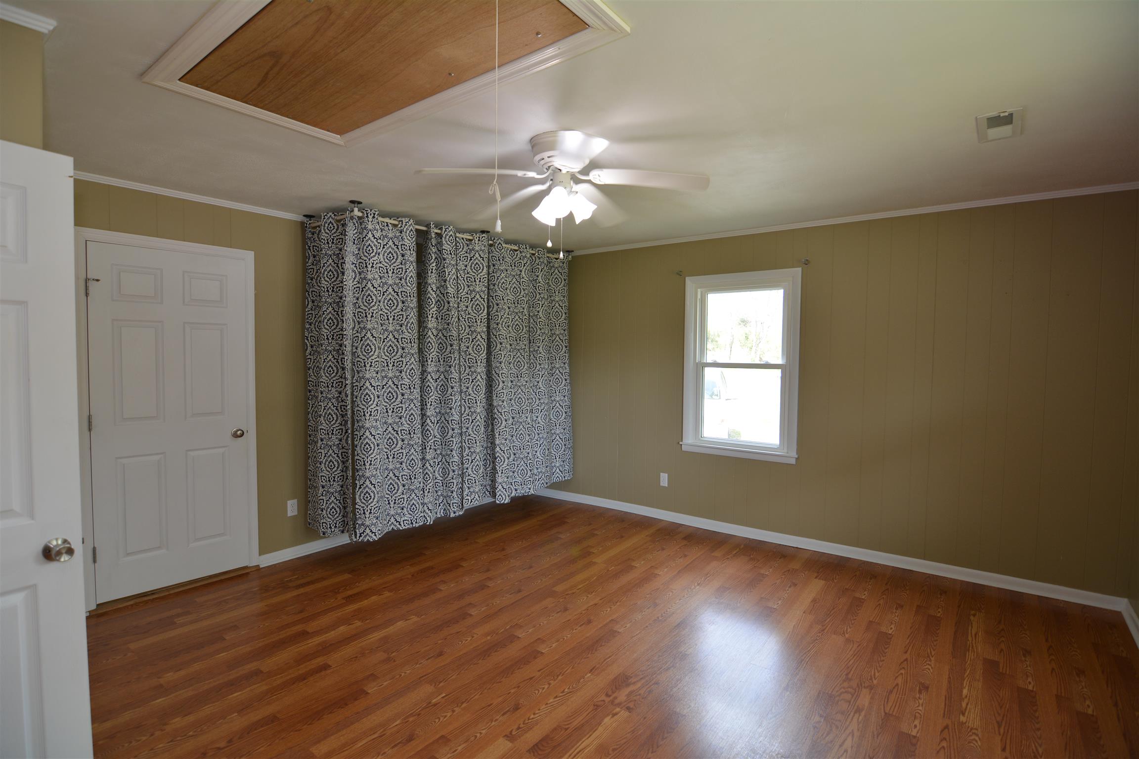 136 McBurg Road Frankewing, TN 38459 - Photo 3 of 20 Off of the living room, you'll find the master bedroom with plenty of closet space.