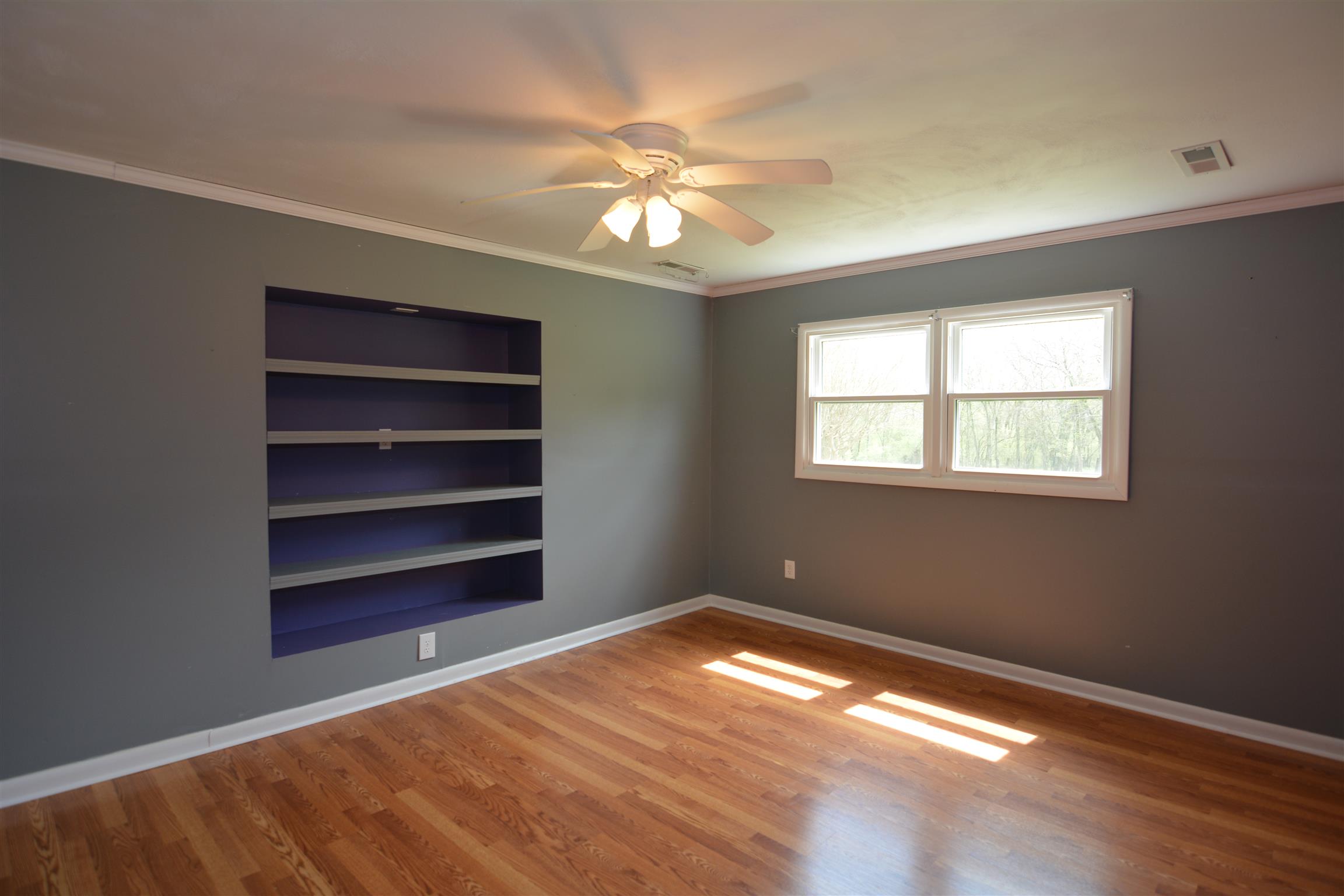 136 McBurg Road Frankewing, TN 38459 - Photo 9 of 20 The back room also has a large walk in closet and built in storage.