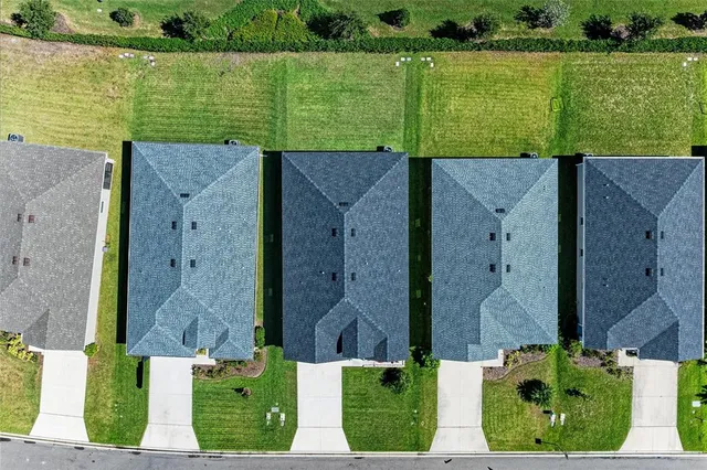 an aerial view of multiple house