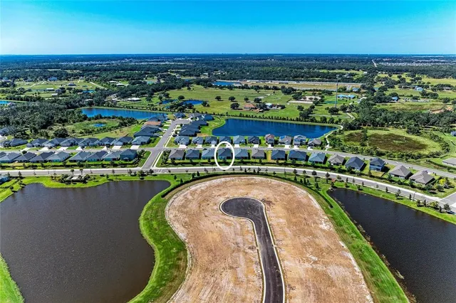 an aerial view of a house with a garden