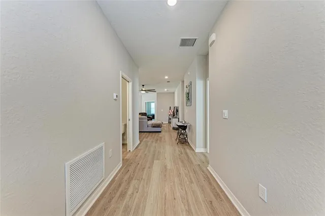 a bed room with bed and a window