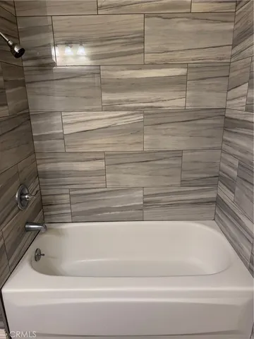 a bathroom with a bathtub