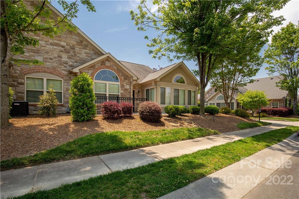 705 Ledgestone Court Tega Cay, SC 29708 - Photo 3 of 24 a front view of a house with garden