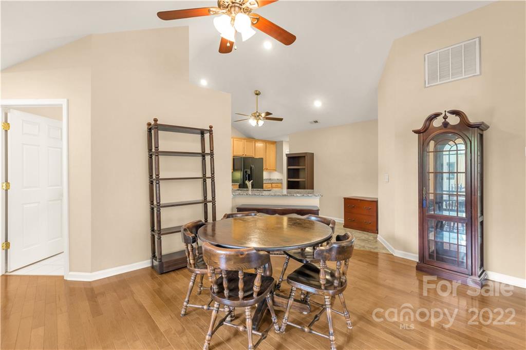 705 Ledgestone Court Tega Cay, SC 29708 - Photo 7 of 24 a dining room with furniture and window