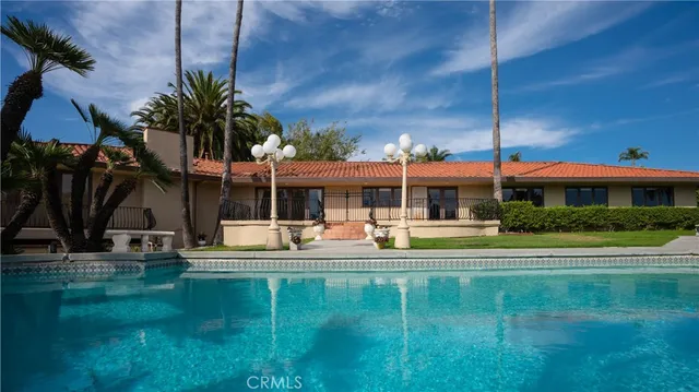 a view of a back yard from a balcony