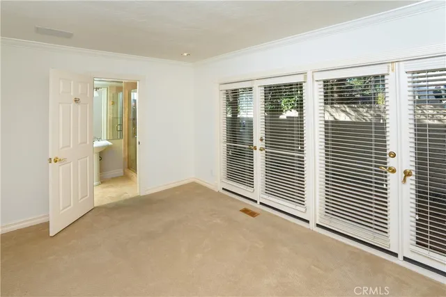 swimming pool view with a garden