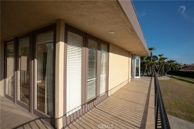 a view of house with a yard