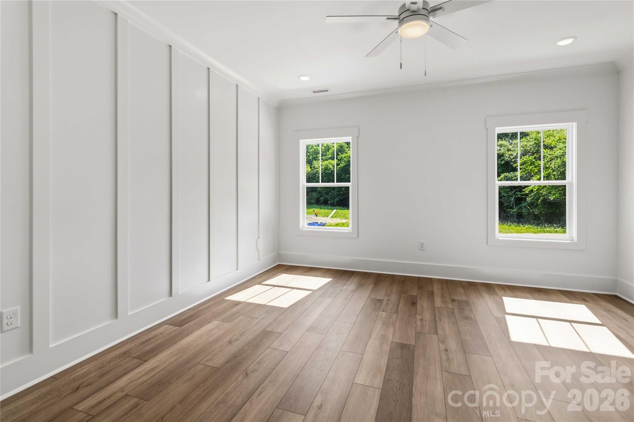 352 Adams Road Clover, SC 29710 - Photo 15 of 38 wooden floor in an empty room with a window