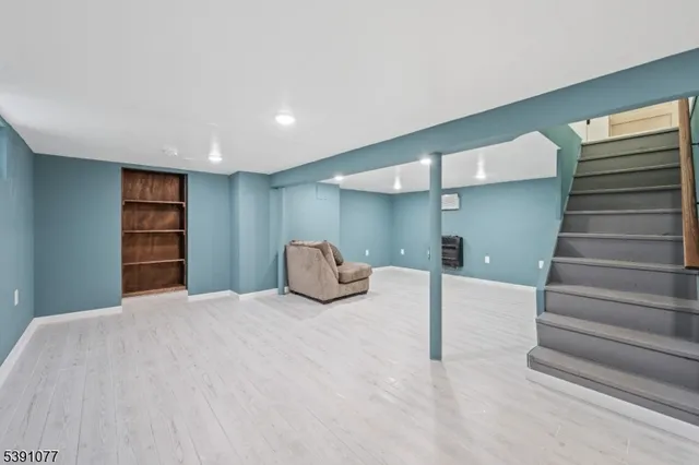 a view of a livingroom with a staircase