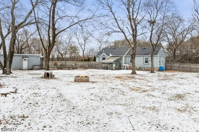 a view of snow on the side of road