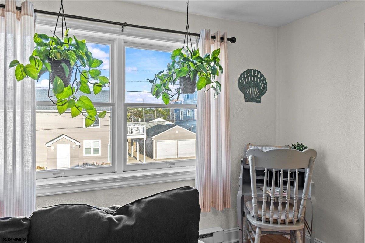 1000 West Brigantine Avenue, Unit 4 Brigantine, NJ 08203 - Photo 13 of 35 a view of a balcony with a potted plant